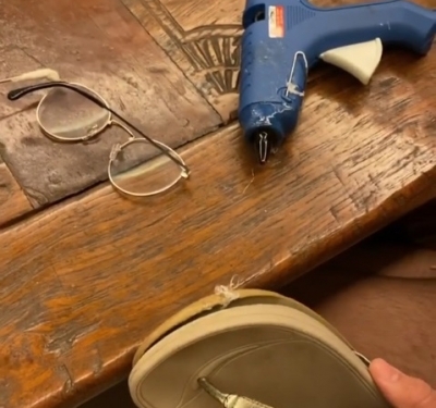 Twinkle Khanna tries her hands in repairing broken slipper, specs.