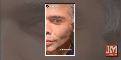 Karan Johar flaunts his greys on social media