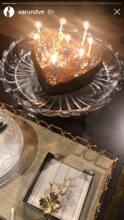 Varun Dhawan cuts heart-shaped cake at home.