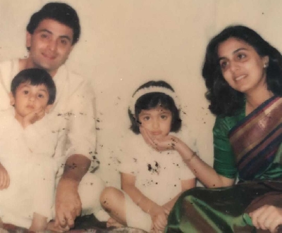 Throwback Thursday: Cute little Ranbir sits in Rishi Kapoor's lap.