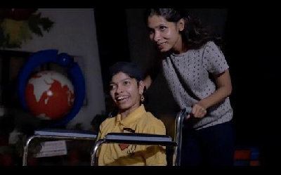 Milli Cafe founder Alina Alam with a worker.