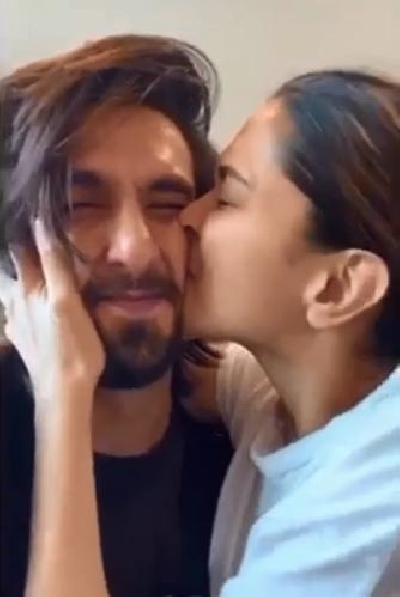Deepika kisses 'cutie' Ranveer's 'squishable face'.