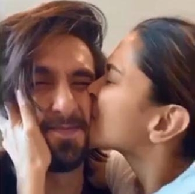 Deepika kisses 'cutie' Ranveer's 'squishable face'.