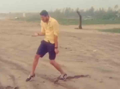 Siddhant Chaturvedi dances on the beach.