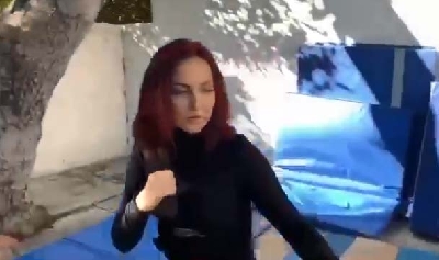 Elli AvrRam's action video tributes John Lennon, Milla Jovovich.