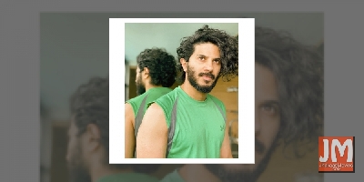 Dulquer Salmaan gets busy 'rocking some curls'
