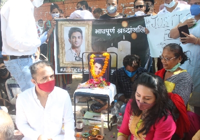 Ankit and Ganesh friends of Sushant Singh Rajput along with others supporters sitting in a dharna during a protest, demanding justice for SSR, at Jantar Mantar, in new Delhi on Friday. photo by Bidesh