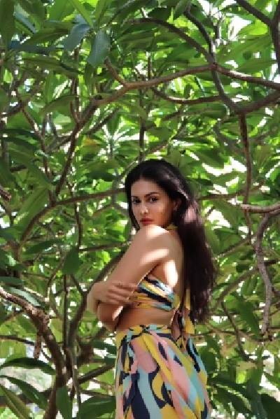 Amyra Dastur strikes a boho pose in the garden.