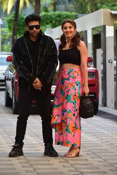 Mumbai: Singers Guru Randhawa and Dhvani Bhanushali seen at the office of T-Series at Mumbai's Andheri on Oct 5, 2020. (Photo: IANS)