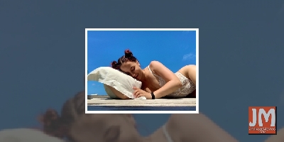 Elli AvrRam rocks in pristine white lace bodycon