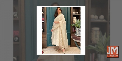 Anushka flaunts pregnancy glow in white ensemble