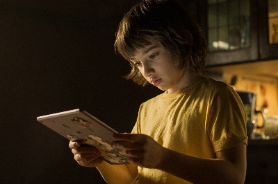 Horror film 'Come Play' probes link between technology and loneliness.