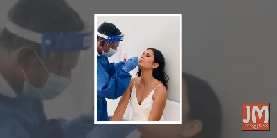 Katrina undergoes Covid test 'with a smile'