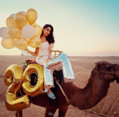 Nora Fatehi rides a camel to celebrate 20 Million Instagram followers.