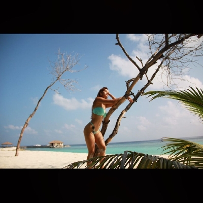 Disha Patani sizzles in a tiny aqua bikini.(photo:Instagram)