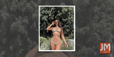 Kim Kardashian flaunts tiny waist in tie-up bikini