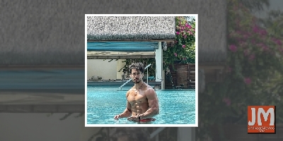 Tiger Shroff flaunts his perfect washboard abs in pool picture