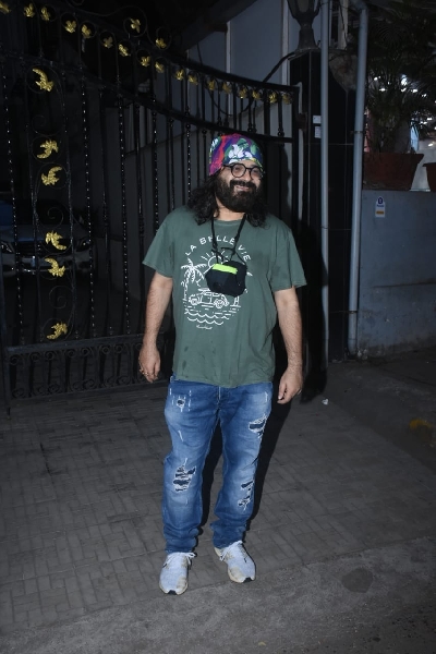 Mumbai: Pritam, Shakun Batra and Karan Johar Spotted at Old DharmaOffice In Khar 11th February 2021. (Photo: IANS)