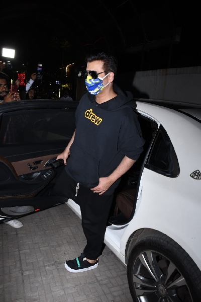 Mumbai: Pritam, Shakun Batra and Karan Johar Spotted at Old DharmaOffice In Khar 11th February 2021. (Photo: IANS)