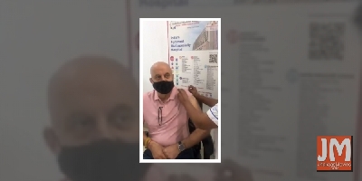 Anupam Kher takes first dose Covid vaccine