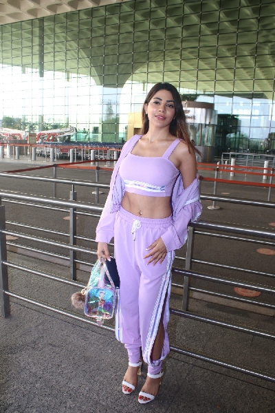 Mumbai: Nikki Tamboli Spotted at Airport Departure On Wednesday 07th April, 2021. (Photo: IANS)