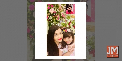Aishwarya posts anniversary celebration pic, with Abhishek on video call