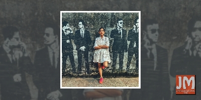 Kubbra Sait shares a cool picture against a wall mural