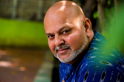 South Indian film-maker Arun Vaidyanathan's next to click with children.