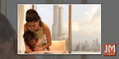 #Motherhood: Sunny Leone helps daughter finish homework