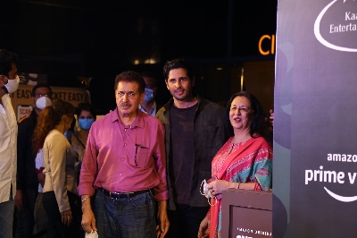 Sidharth Malhotra with his parents