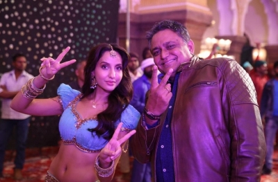 Nora Fatehi and Director Abhishek Dudhaiya