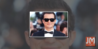 Orlando Bloom felt 'awkward' filming sex scenes with Cara Delevingne