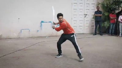 Actor Varun Dhawan with Cricket legend Sachin Tendulkar.