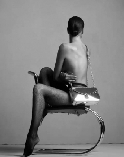 Supermodel Irina Shayk has ditched her clothes and bared it all for a new campaign of a fashion brand. The 33-year-old model went nude in a new campaign to promote Calvin Klein handbags.