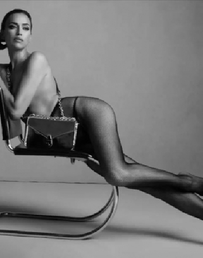 Supermodel Irina Shayk has ditched her clothes and bared it all for a new campaign of a fashion brand. The 33-year-old model went nude in a new campaign to promote Calvin Klein handbags.