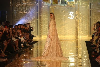 Mumbai: Actress Deepika Padukone showcases a creation of fashion designer Abu Jani-Sandeep Khosla during a fashion show in Mumbai, on Sep 5, 2019. (Photo: IANS)