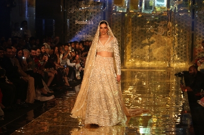 Mumbai: Actress Deepika Padukone showcases a creation of fashion designer Abu Jani-Sandeep Khosla during a fashion show in Mumbai, on Sep 5, 2019. (Photo: IANS)