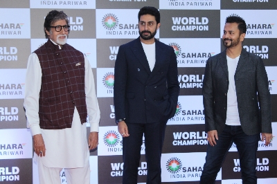 Mumbai: Actors Amitabh Bachchan and Abhishek Bachchan at PV Sindhu's felicitation ceremony organised by Sahara Group in Mumbai on Sep 8, 2019. (Photo: IANS)