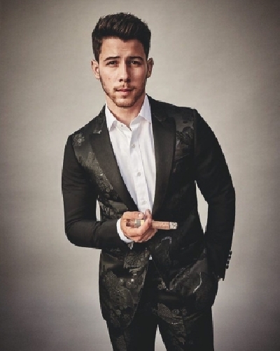 Singer Nick Jonas is thrilled about being the first person under 30 to hold a cigar and feature on the cover of Cigar Aficionado magazine. Like most of his fans, his wife and actress Priyanka Chopra went on gushing about the 