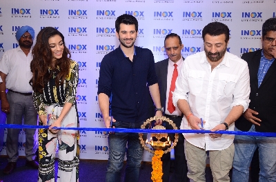 Jalandhar: Actors Sunny Deol, Karan Deol and Sahher Bambba at the launch of a cinema hall in Jalandhar on Sep 14, 2019. (Photo: IANS)