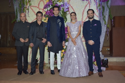 Mumbai: Filmmaker Sooraj Barjatya and actors Salman Khan and Madhuri Dixit with the newly weds Devaansh Barjatya (Sooraj Barjatya's son) and Nandini (Barjatya's daughter-in-law) at their wedding reception in Mumbai on Nov 29, 2019. (Photo: IANS)