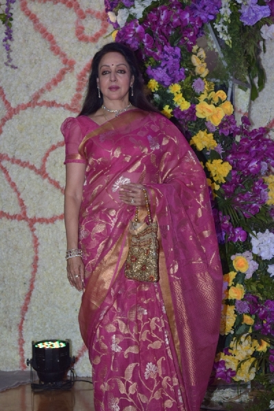 Mumbai: Actress Hema Malini at the wedding reception of filmmaker Sooraj Barjatya's son Devaansh Barjatya in Mumbai on Nov 29, 2019. (Photo: IANS)