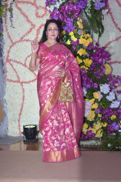 Mumbai: Actress Hema Malini at the wedding reception of filmmaker Sooraj Barjatya's son Devaansh Barjatya in Mumbai on Nov 29, 2019. (Photo: IANS)